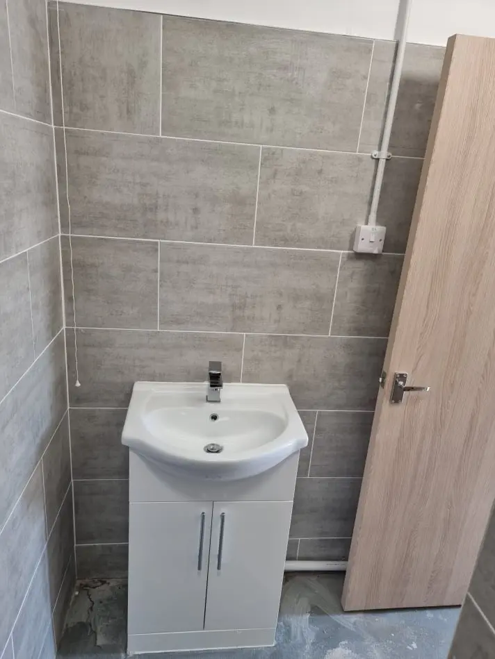 Qualified plumber repairing copper pipes – Hampshire plumbing expert